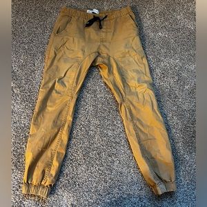 Drake Joggers, slight tear in rear